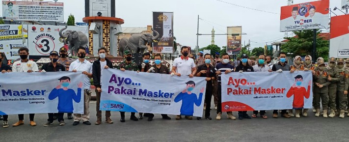 SMSI Lampung bersama TNI dan Polri, Bagikan 3000 Masker.